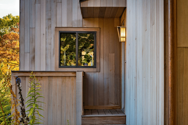 Clear Cedar Siding Weathered with Bleaching Oil
